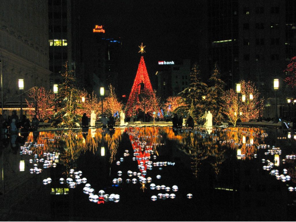 A picture containing outdoor, night, light, city, christmas decorations and lights